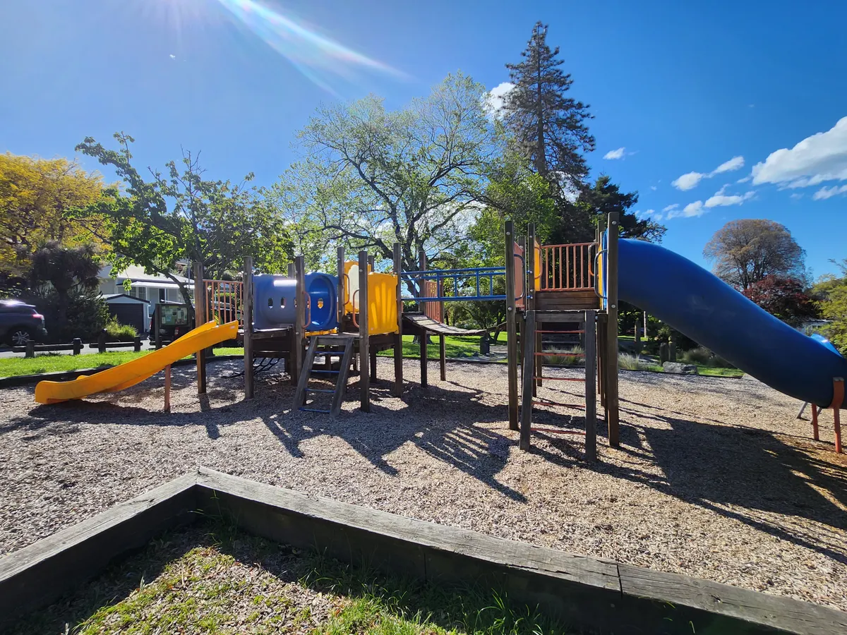Multi-play tower with blue tube slide at Heathcote Domain Playground, Heathcote Valley