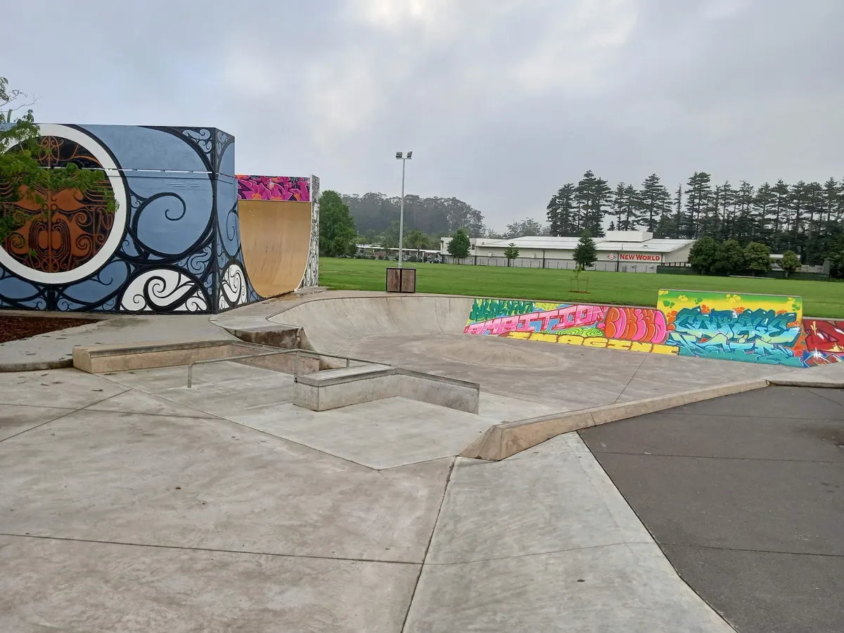Skate bowl and mural-covered vert ramp at Kerikeri Skatepark on Cobham Road