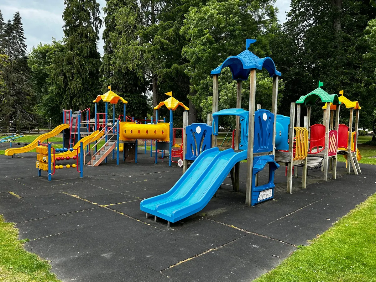 Slides and multi-play towers on rubber matting at Geraldine Domain playground, Geraldine