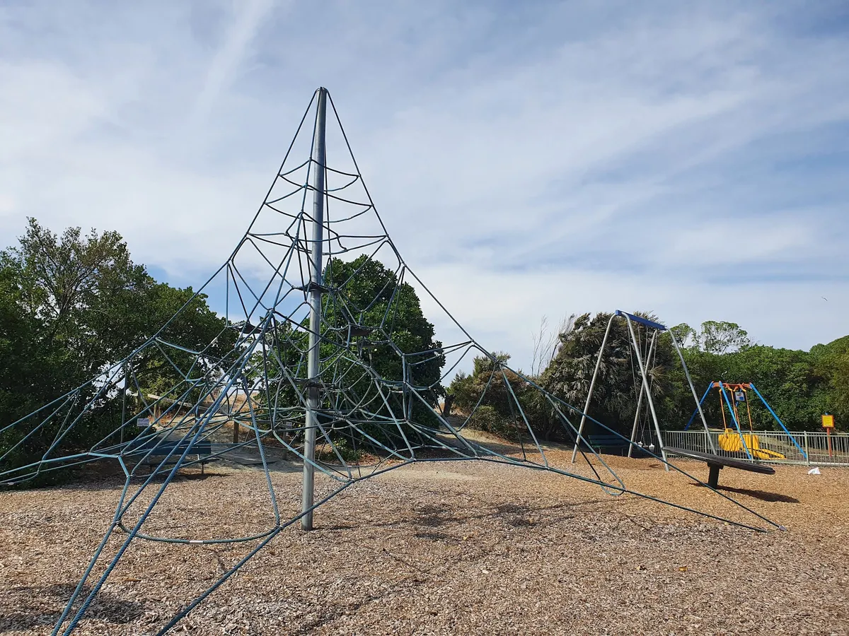 Rope spacenet, seesaw and swings at Tahunanui Beach Playground, Nelson