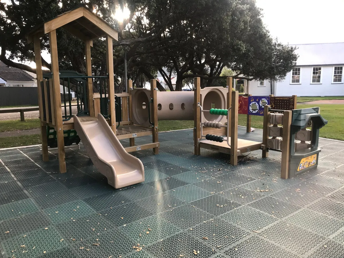 Preschool play structure with slide and tunnel on soft matting at Moera Playground, Lower Hutt